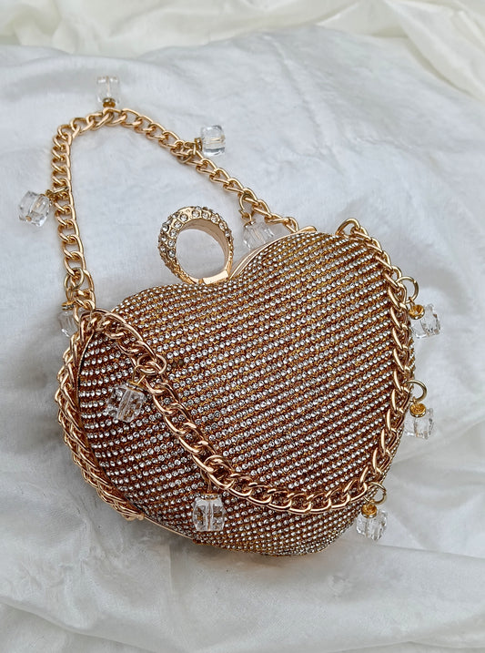 Dil-e-Chic heart-shaped clutch in gold with crystal chain, elegant wedding clutch by The Silken Chic