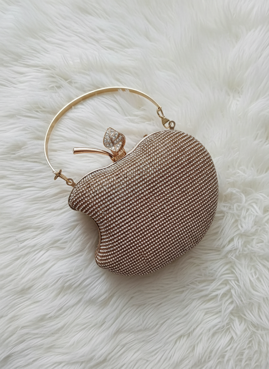 Chic Bite apple-shaped clutch in gold with crystal handle, statement party clutch by The Silken Chic