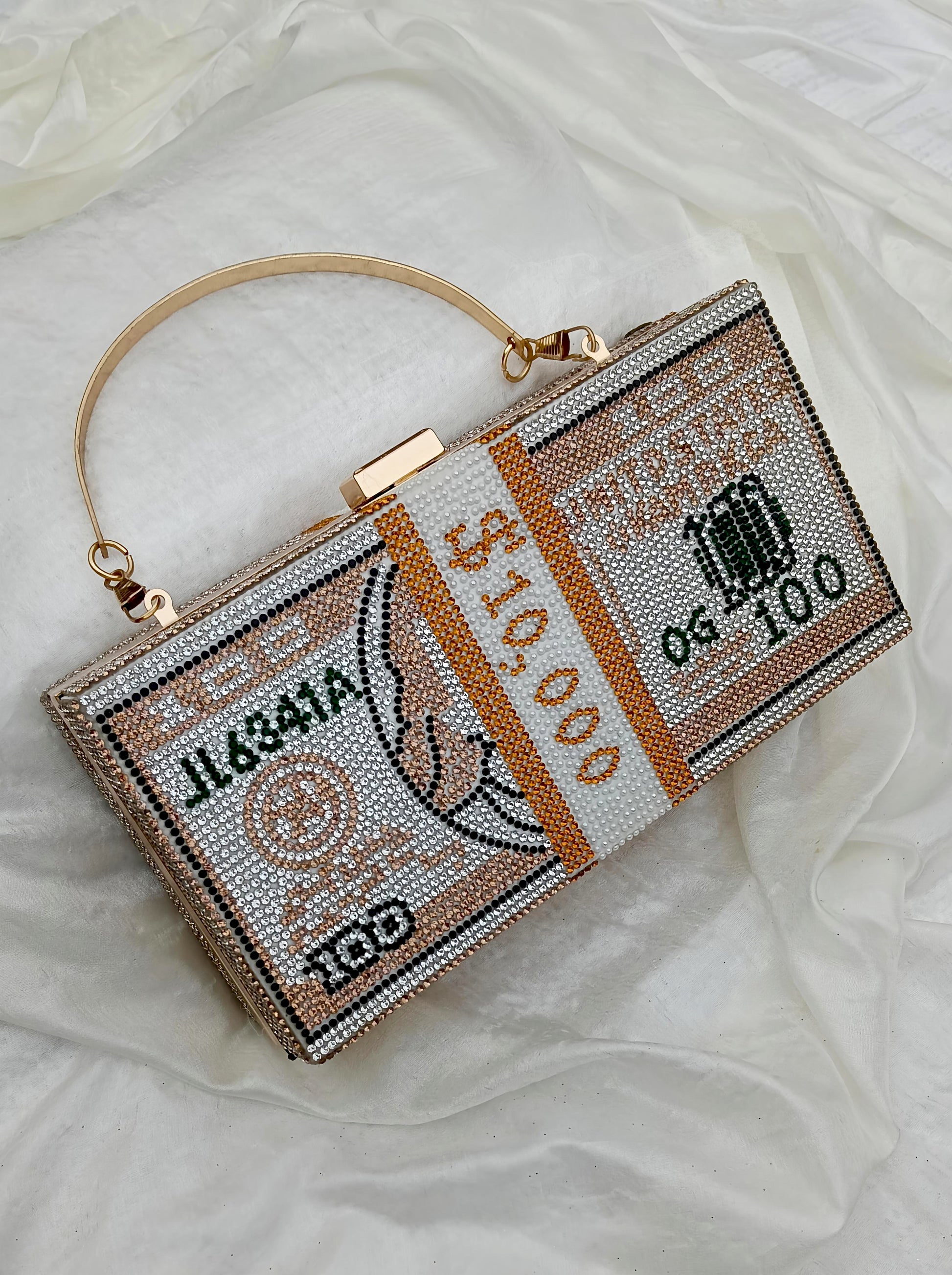 Golden Dollar Chic Clutch – dazzling crystal wedding and party bag by The Silken Chic.