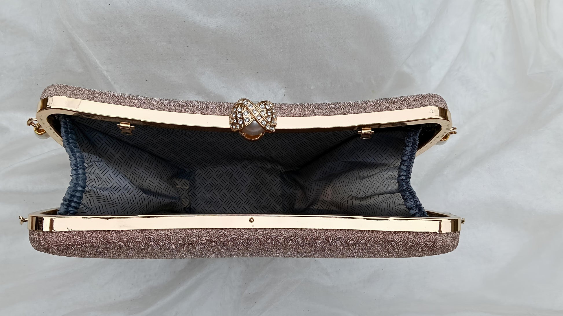 Noor Crescent clutch in gold with elegant half-moon design, evening bag by The Silken Chic
