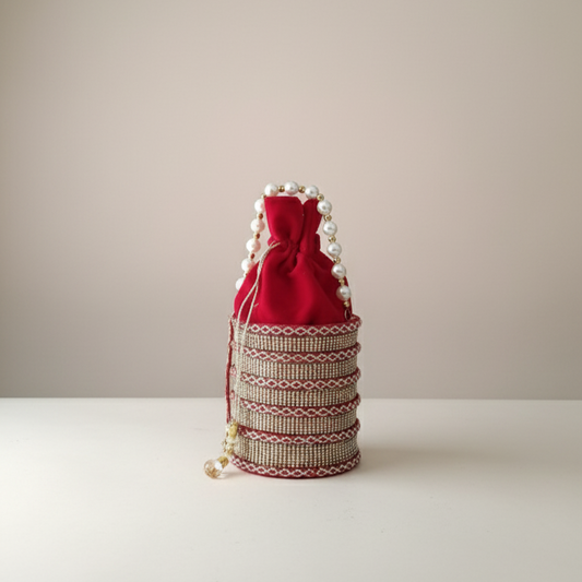 Pearl Chic Potli in red with pearl detailing by The Silken Chic
